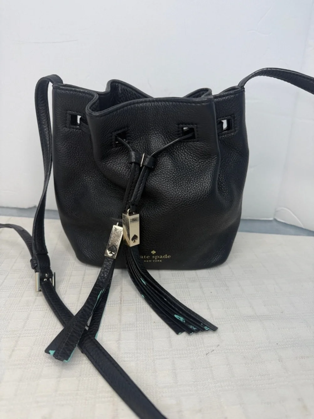 Kate Spade New York drawstring bucket bag, from the Grey Street Tiny Cooper